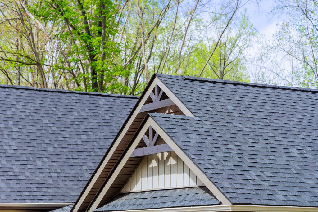 Roofing shingles cover roof of a newly constructed house